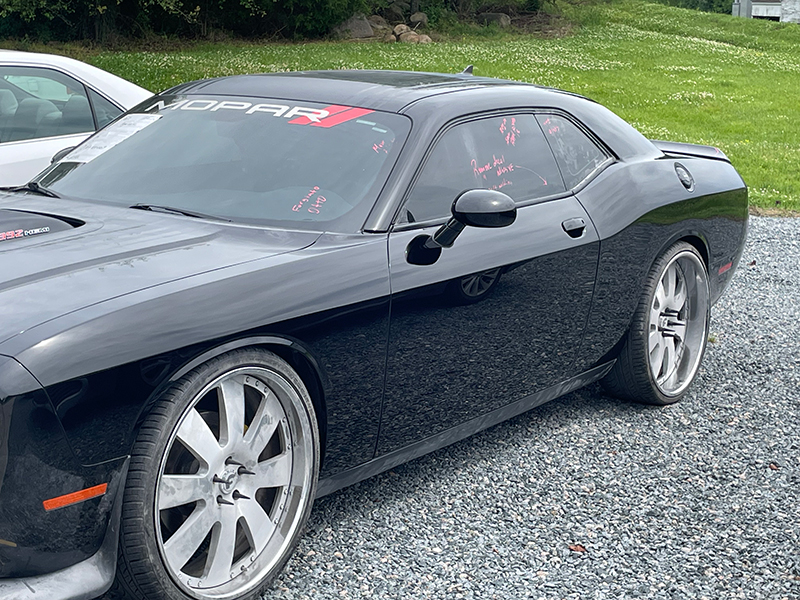 Black Dodge Challenger after collision repair
